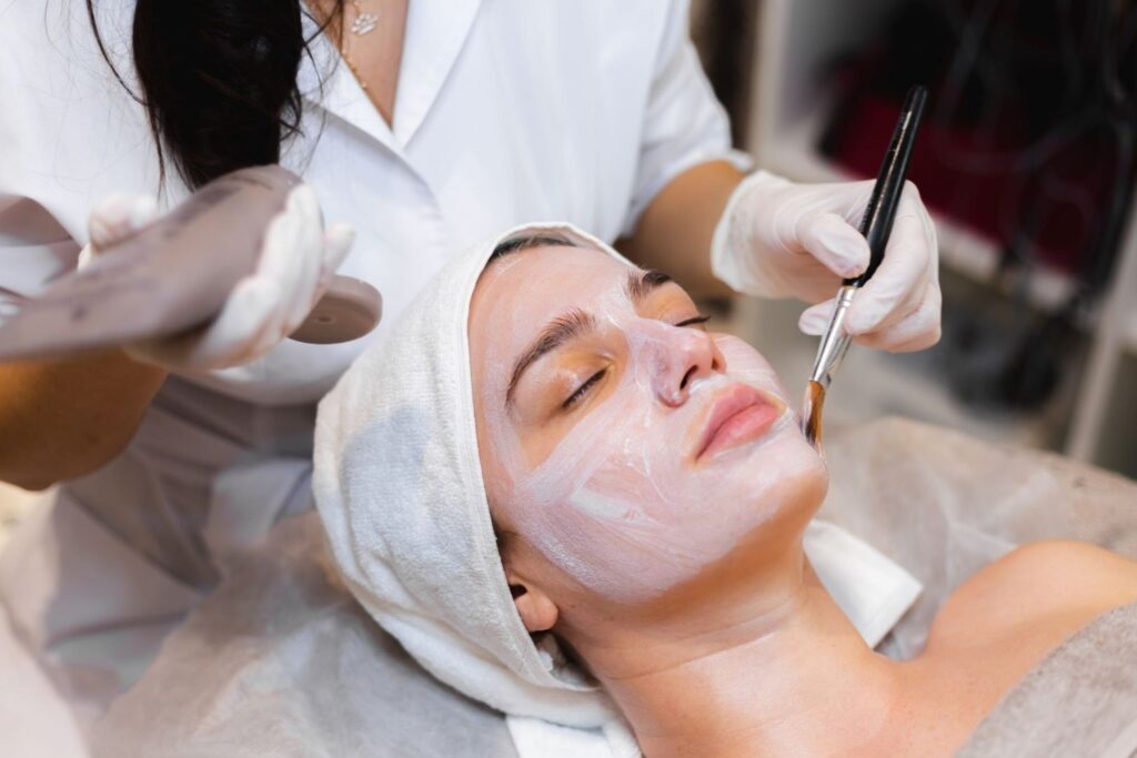 Student receiving express facial treatment at affordable beauty spots in Dubai with budget pricing, representing accessible beauty services for young women managing tight budgets