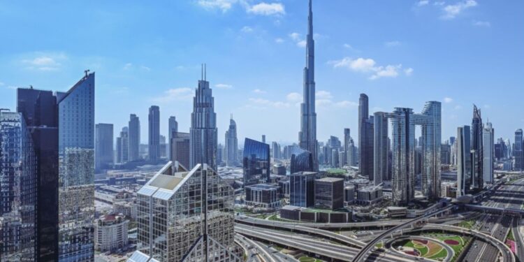 Dubai skyline business district financial growth skyscrapers - DUBAIwebzine Economic forecast 2026 Dubai showing GDP growth with iconic skyline and investment opportunities
