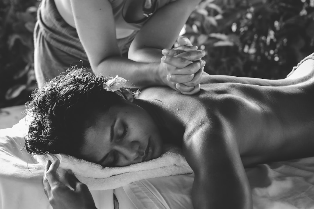 A couple enjoying a spa treatment as part of a Dubai staycation wellness experience