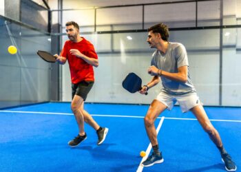 men playing padel at one of Dubais popular indoor sports venues during summer