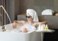 A woman receiving a spa treatment included in a Dubai hotel staycation rates package during the low season