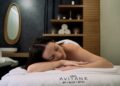 A woman resting during a luxurious indoor wellness retreat spa session in Dubai