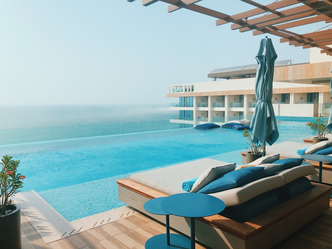A couple enjoys a private cabana day at one of Dubai's luxury pools high above the city