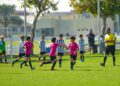 child-class-dubai-unsplash - DUBAIwebzine A young girl focused on building a robot during after-school programmes in Dubai