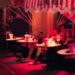A couple enjoying terrace dining in Dubai at a candlelit outdoor table with soft evening light