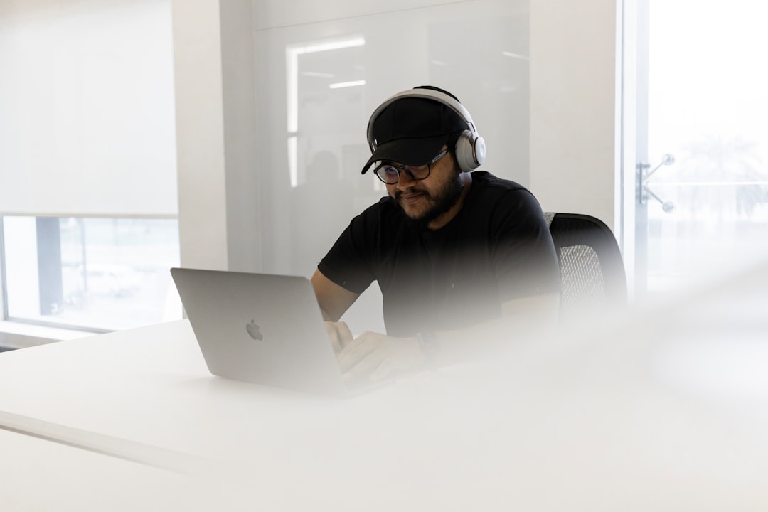 A startup founder works on her Dubai business application from a coworking space in the city