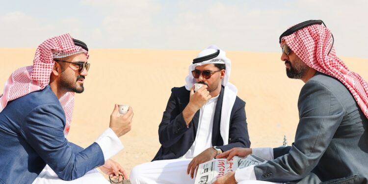 Dubai hiring who is recruiting now photo 1 Recruiter reviewing applications during a Dubai hiring interview