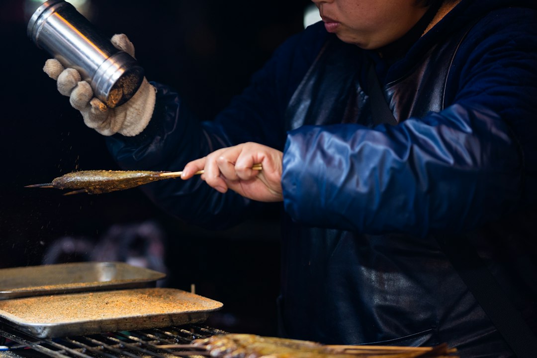 Home cook preparing seafood market fish for a family dinner
